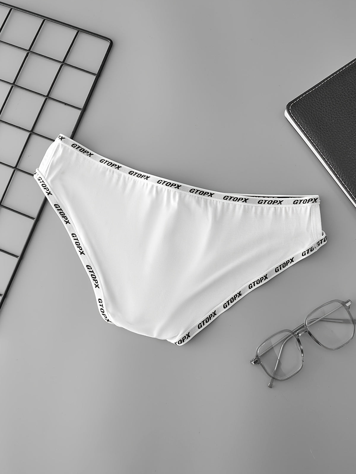 Men's sexy and comfortable hollowed-out low-rise briefs