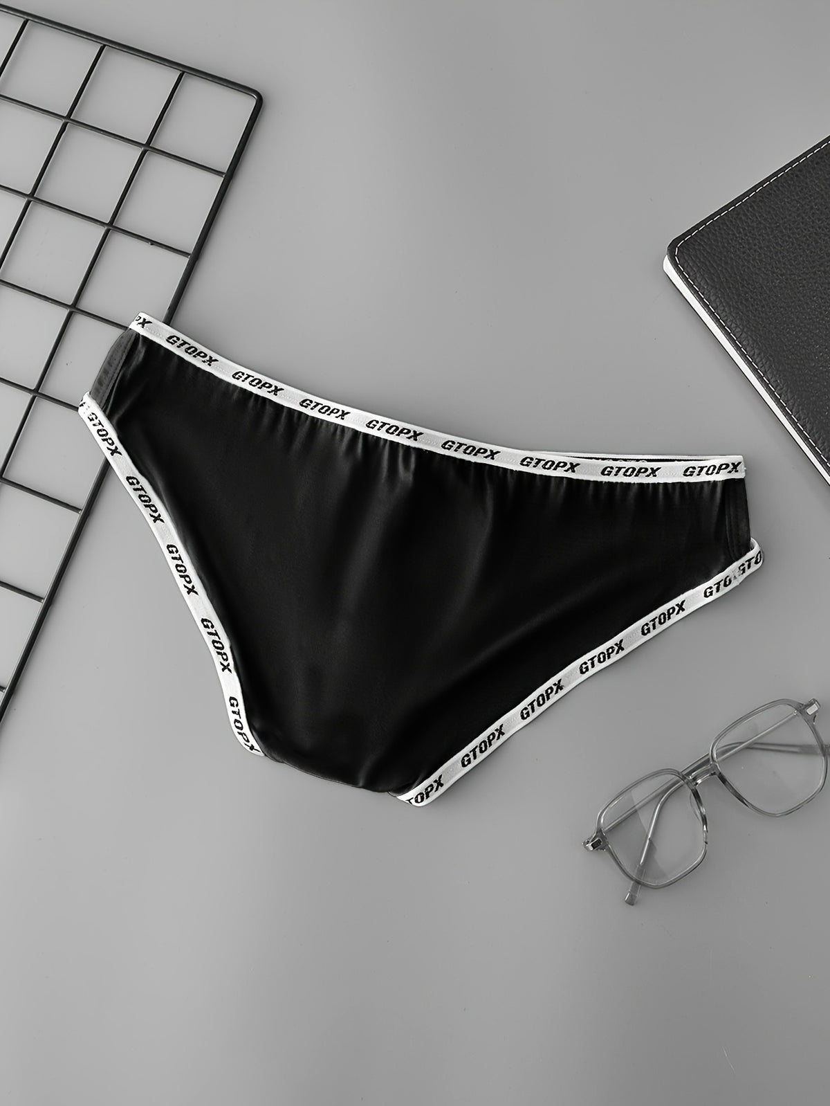 Men's sexy and comfortable hollowed-out low-rise briefs
